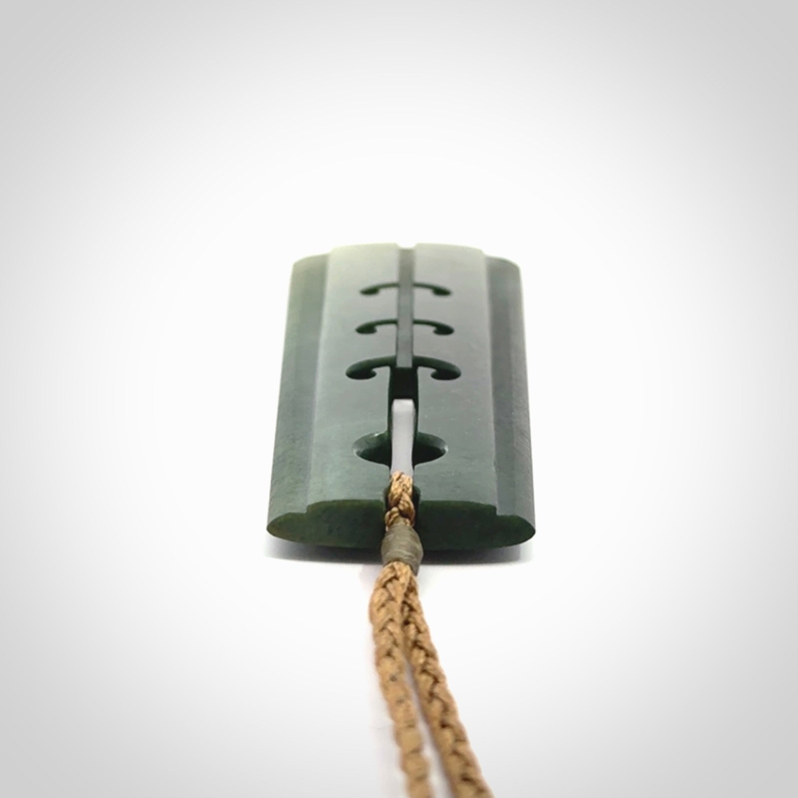Hand made large New Zealand jade toki with hammerhead design pendant. Hand carved in New Zealand by Kerry Thompson. Unique large Jade Toki with adjustable cord.