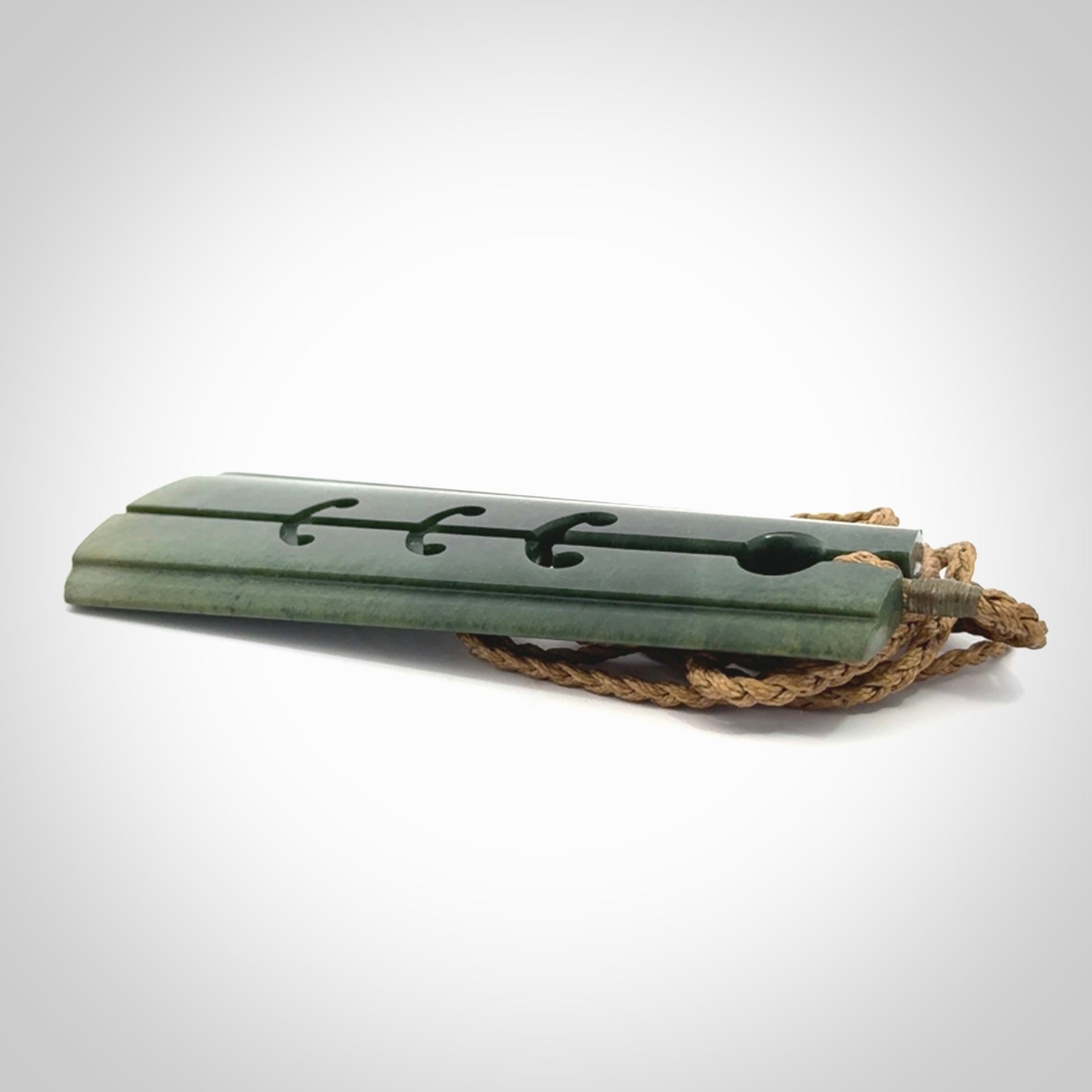 Hand made large New Zealand jade toki with hammerhead design pendant. Hand carved in New Zealand by Kerry Thompson. Unique large Jade Toki with adjustable cord.