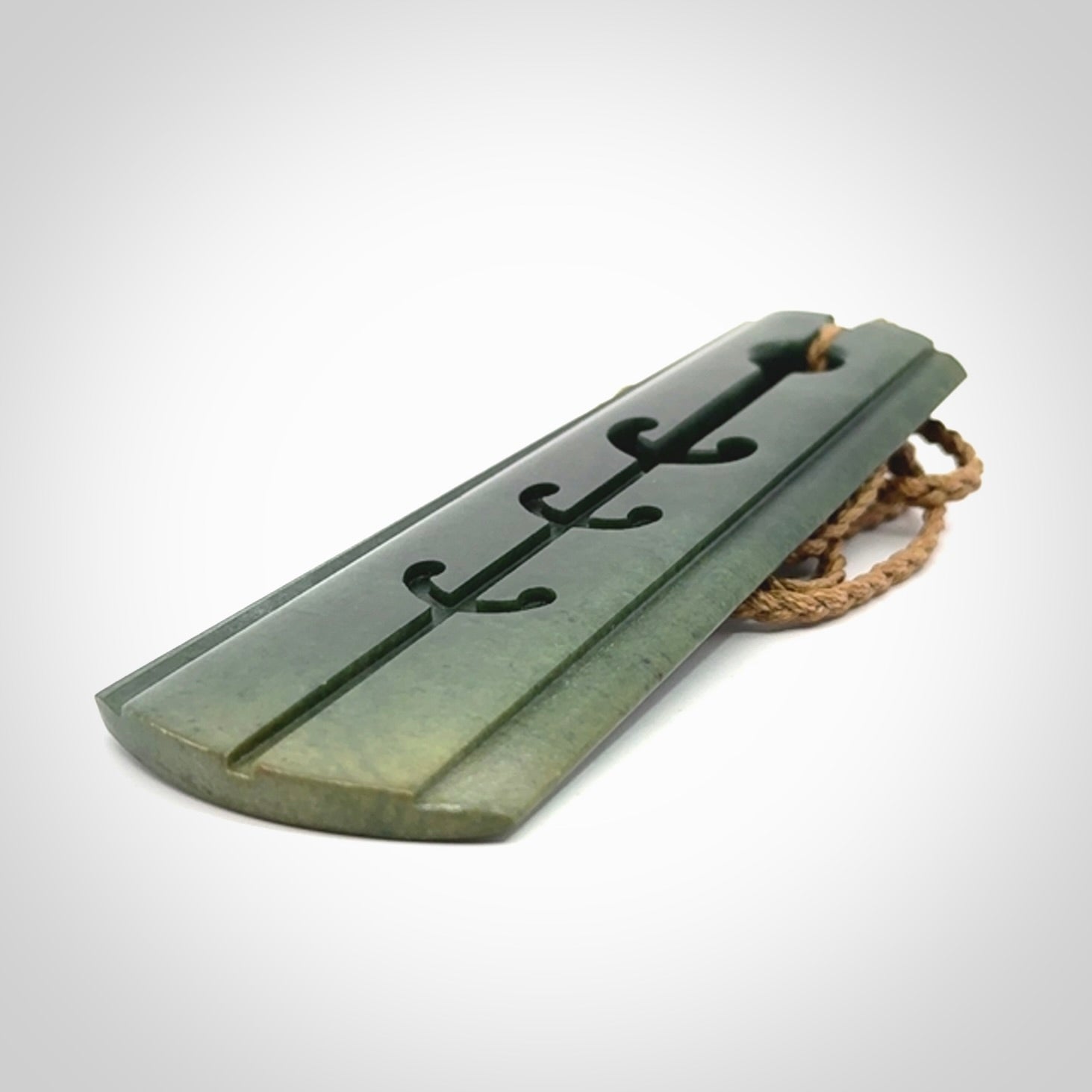 Hand made large New Zealand jade toki with hammerhead design pendant. Hand carved in New Zealand by Kerry Thompson. Unique large Jade Toki with adjustable cord.