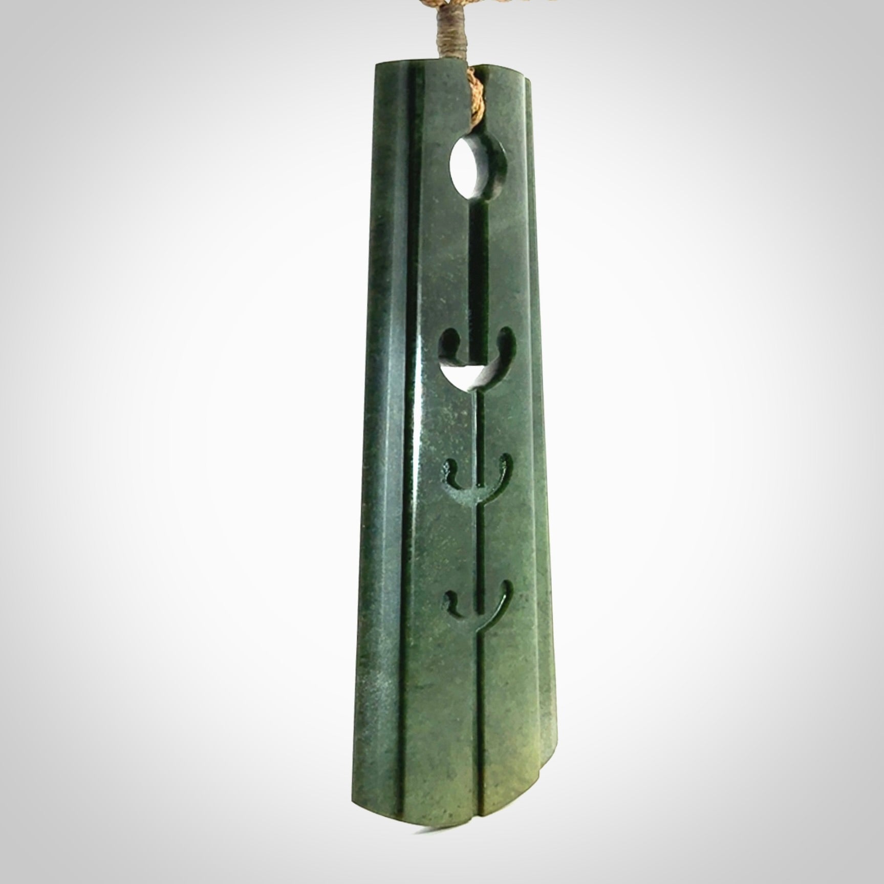 Hand made large New Zealand jade toki with hammerhead design pendant. Hand carved in New Zealand by Kerry Thompson. Unique large Jade Toki with adjustable cord.