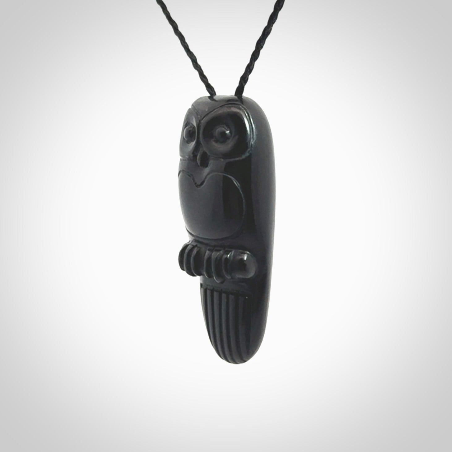 A Owl design carving, hand made for us from Australian Black Jade. This pendant is provided with an adjustable black cord.