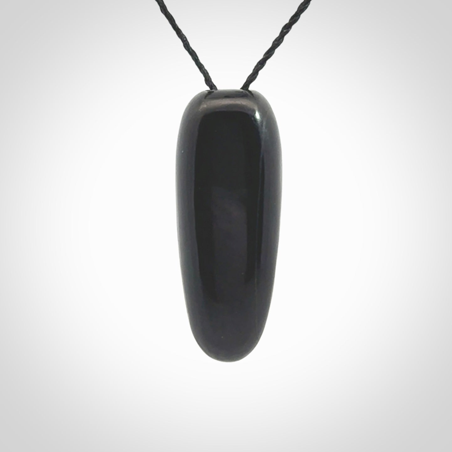 A Owl design carving, hand made for us from Australian Black Jade. This pendant is provided with an adjustable black cord.