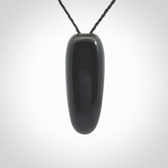 A Owl design carving, hand made for us from Australian Black Jade. This pendant is provided with an adjustable black cord.
