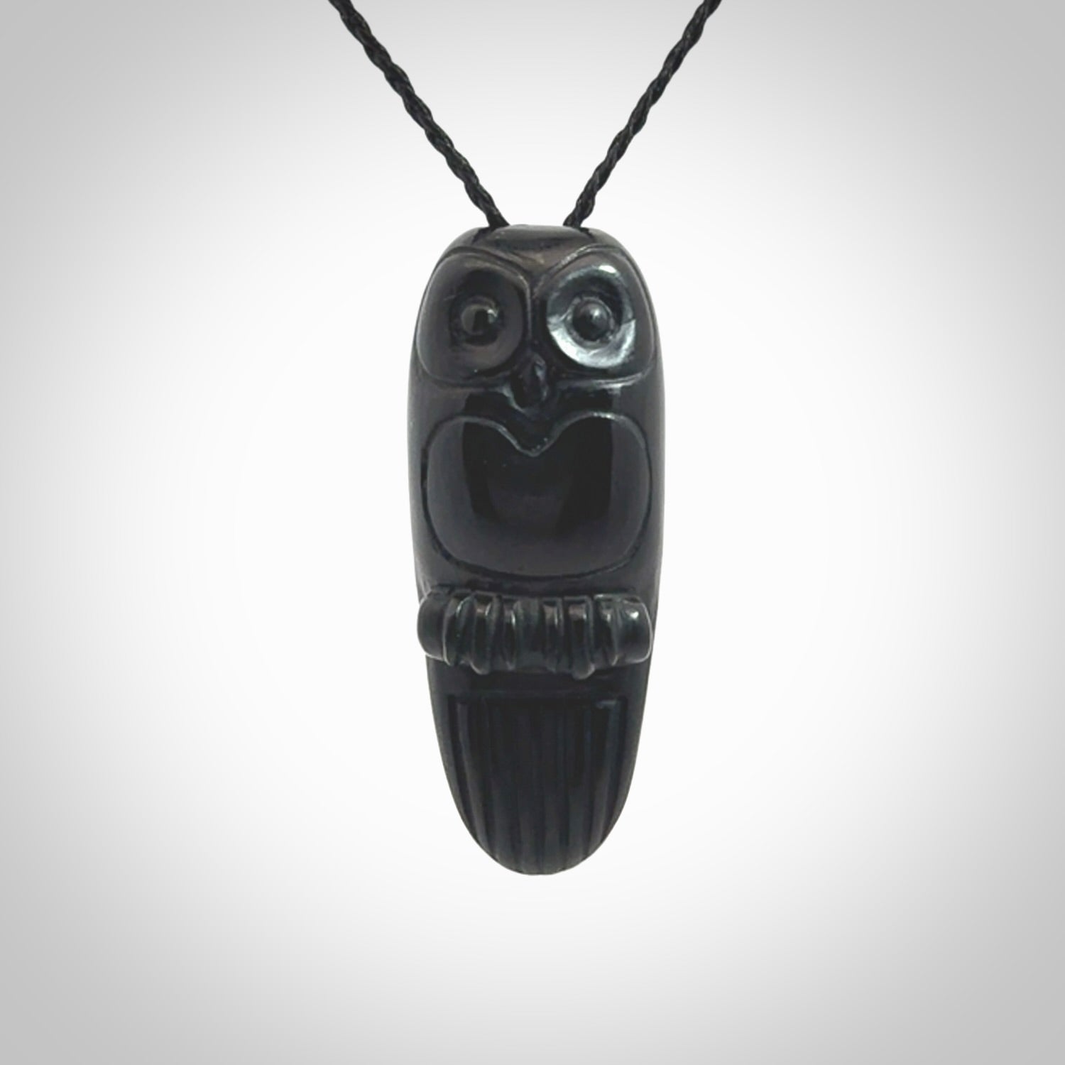 A Owl design carving, hand made for us from Australian Black Jade. This pendant is provided with an adjustable black cord.