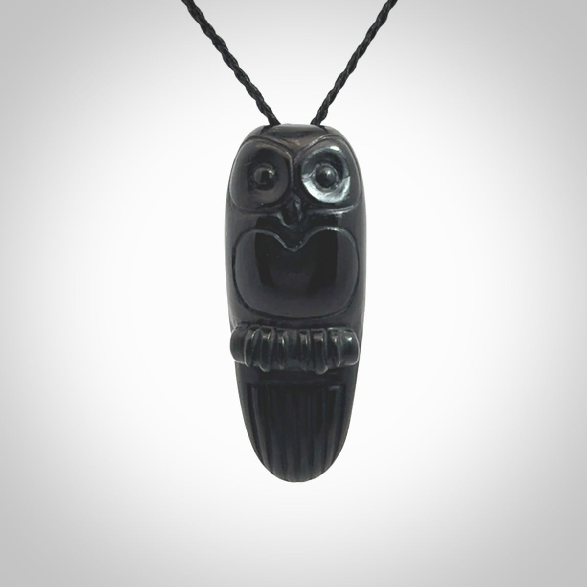 A Owl design carving, hand made for us from Australian Black Jade. This pendant is provided with an adjustable black cord.