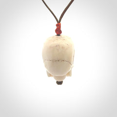 These are handmade skull pendants carved from deer antler. A fantastic piece if you like skulls and would like a medium sized piece. The cord is adjustable so you can wear this where it suits you best. We ship these free worldwide.