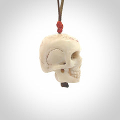These are handmade skull pendants carved from deer antler. A fantastic piece if you like skulls and would like a medium sized piece. The cord is adjustable so you can wear this where it suits you best. We ship these free worldwide.