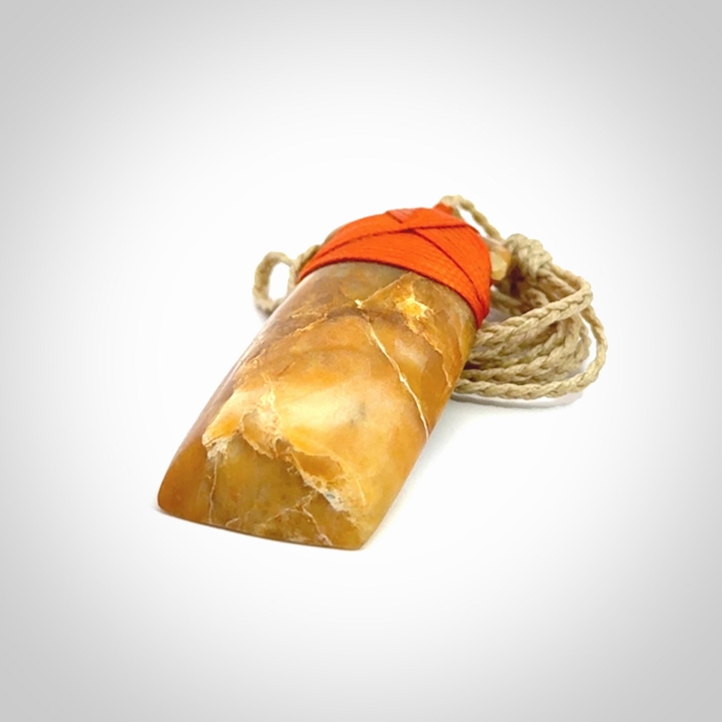 This is a beautiful hand carved Agate toki pendant. Provided with an adjustable cord and packaged in a woven kete pouch.