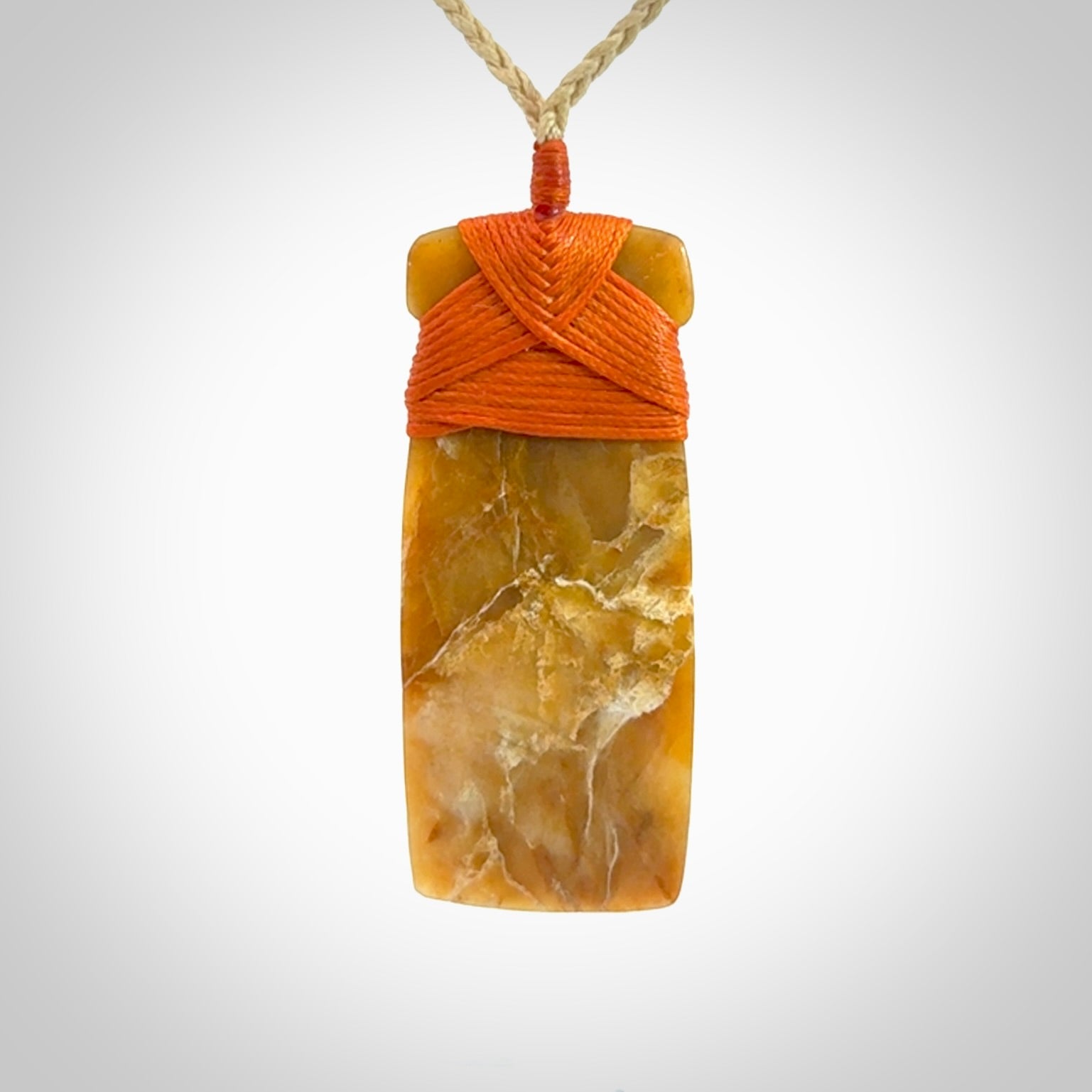This is a beautiful hand carved Agate toki pendant. Provided with an adjustable cord and packaged in a woven kete pouch.