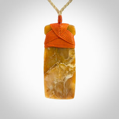 This is a beautiful hand carved Agate toki pendant. Provided with an adjustable cord and packaged in a woven kete pouch.