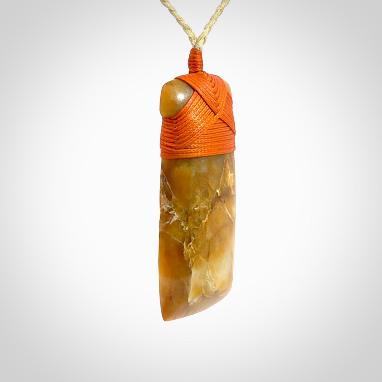 This is a beautiful hand carved Agate toki pendant. Provided with an adjustable cord and packaged in a woven kete pouch.