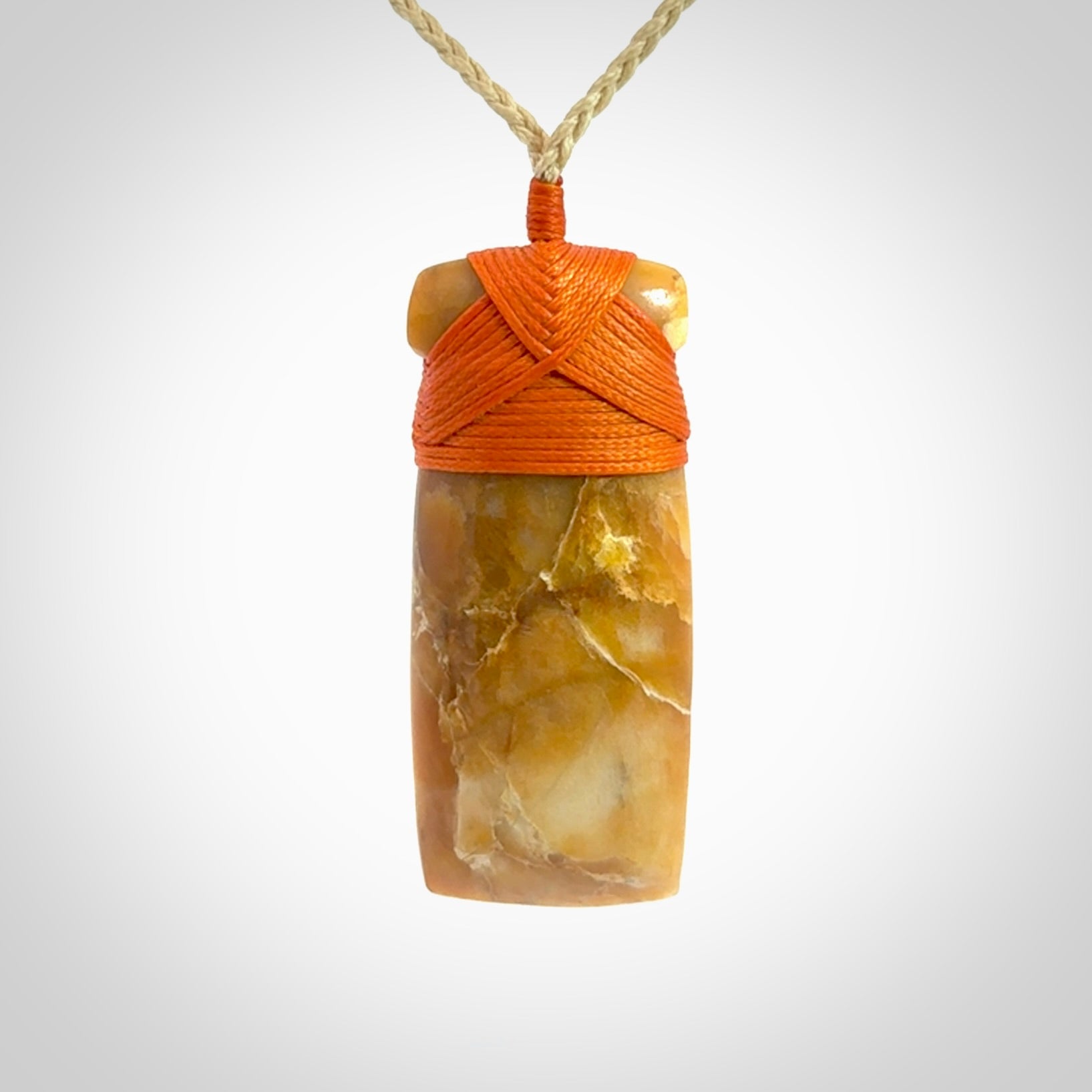 This is a beautiful hand carved Agate toki pendant. Provided with an adjustable cord and packaged in a woven kete pouch.