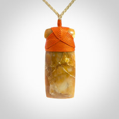 This is a beautiful hand carved Agate toki pendant. Provided with an adjustable cord and packaged in a woven kete pouch.