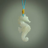 A hand carved Jadeite seahorse pendant. We have carved this from beautiful jadeite and we bind them with our hand-plaited cords. The cords are a waxed polyester so they are durable and strong. We ship these worldwide with express courier anywhere in the world.