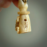 Hand carved Rashōmon Pendant. Made from Red Deer antler in New Zealand. Unique Japanese necklace hand made from deer antler by master bone carver Fumio Noguchi. Spectacular collectable work of art, made to wear. One only pendant, delivered to you at no extra cost with express courier.