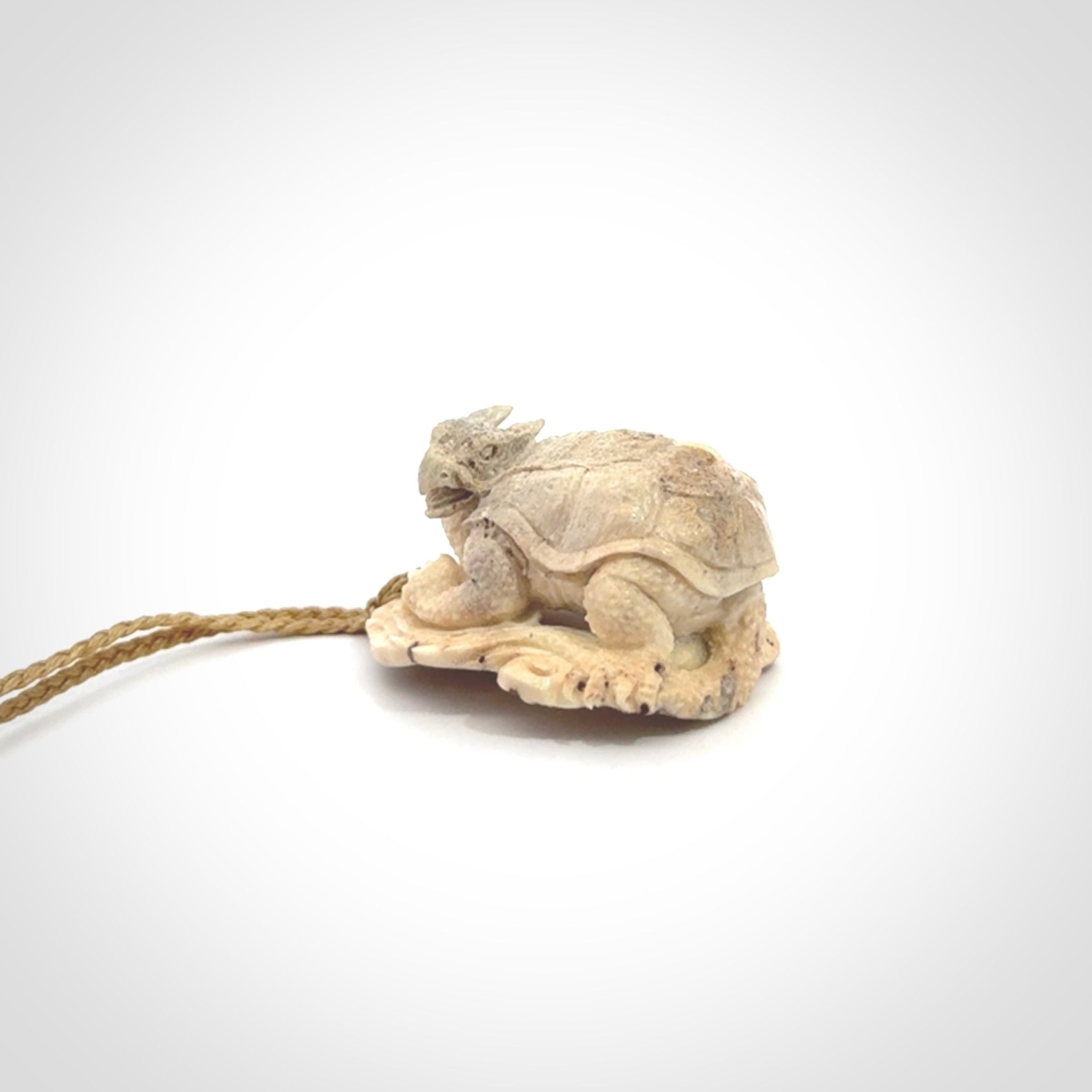 Hand carved deer antler dragon turtle pendant