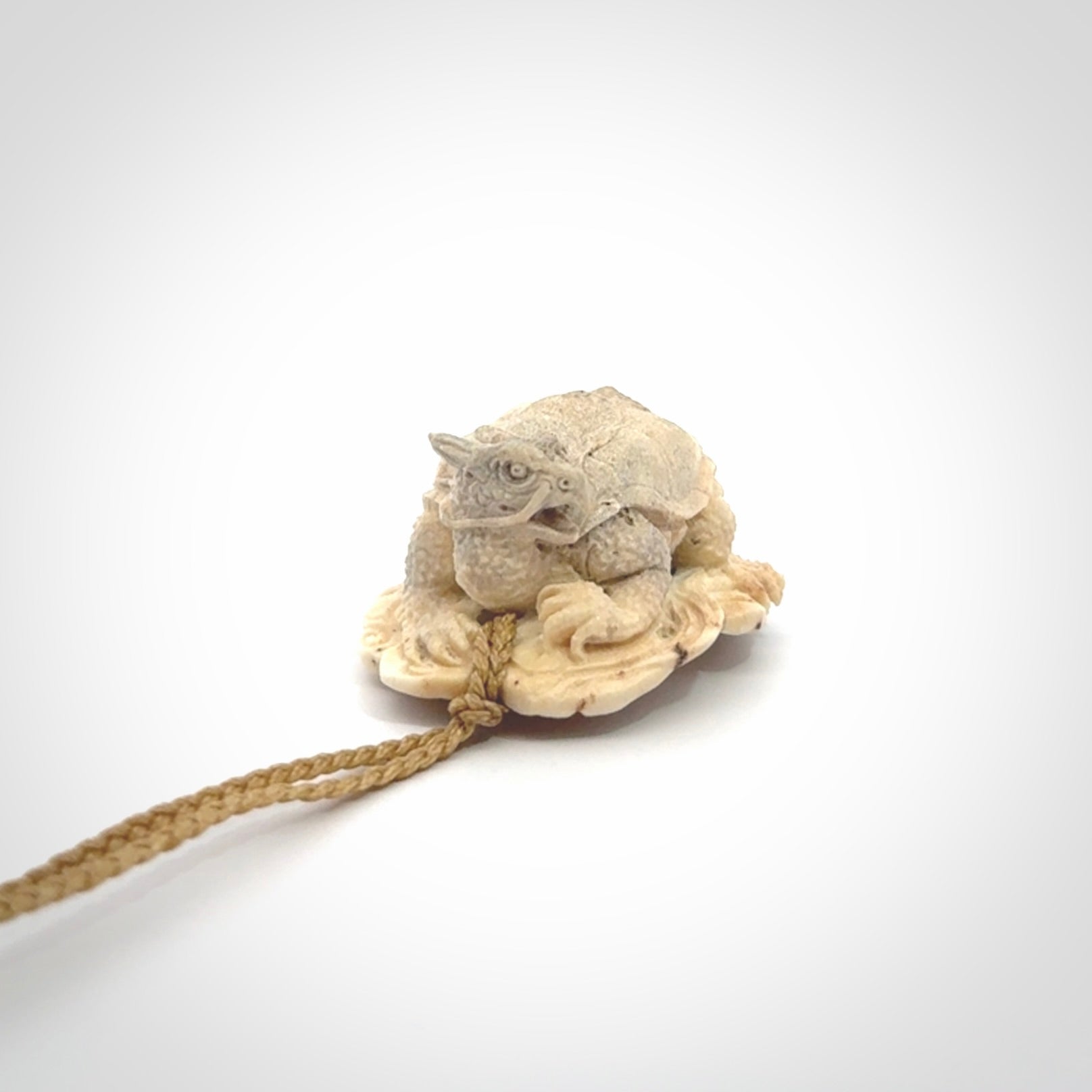 Hand carved deer antler dragon turtle pendant