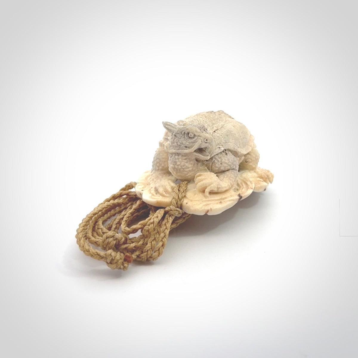 Hand carved deer antler dragon turtle pendant