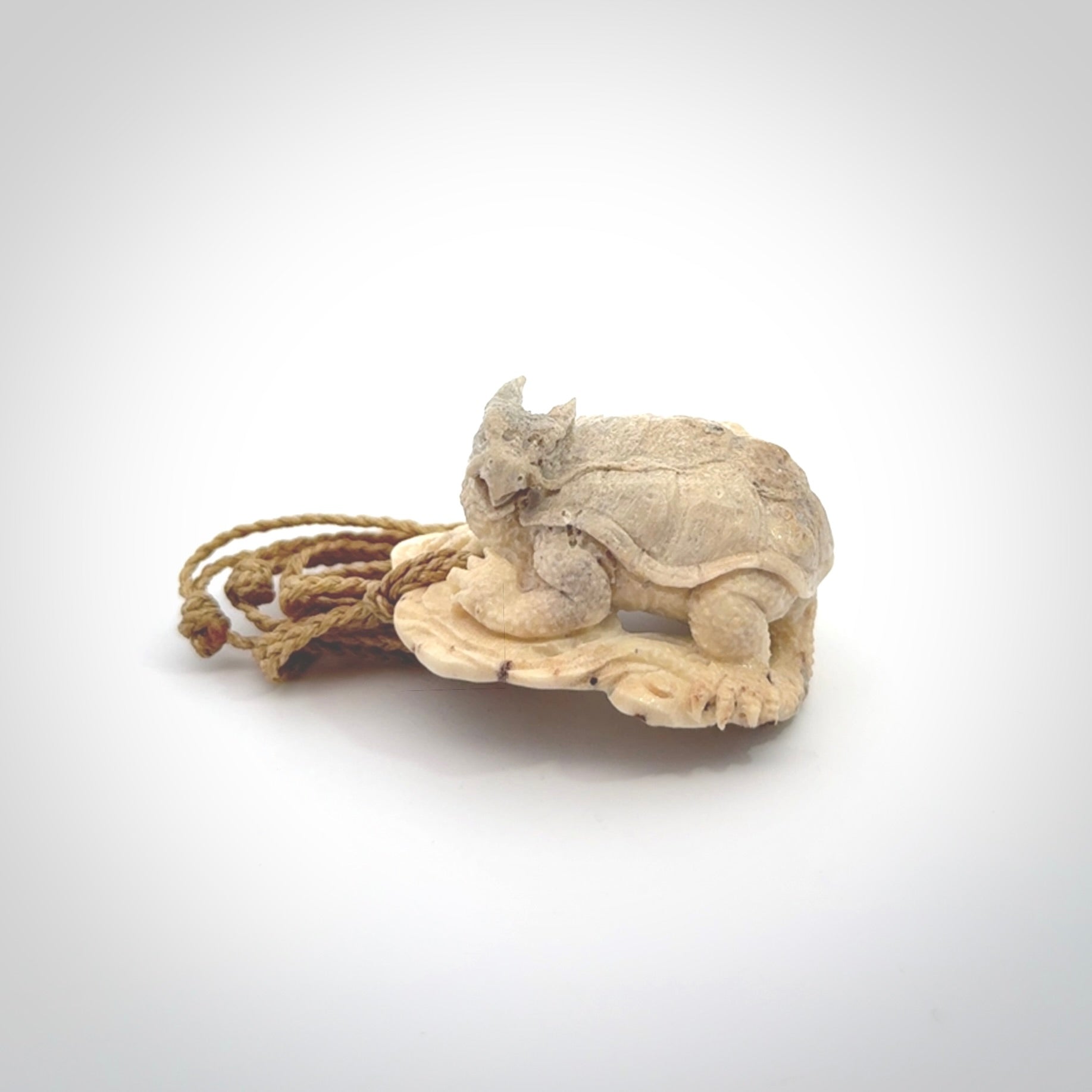 Hand carved deer antler dragon turtle pendant
