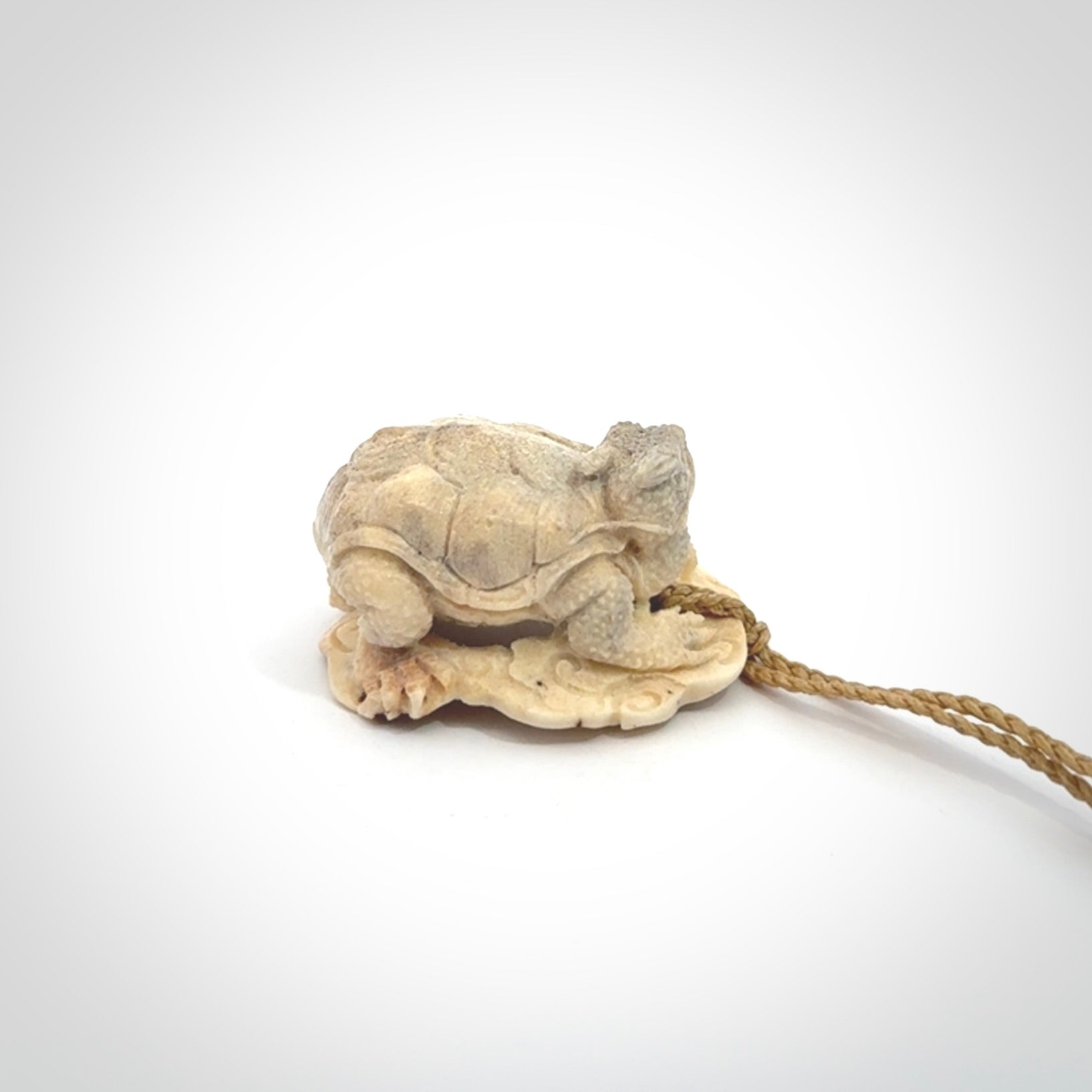 Hand carved deer antler dragon turtle pendant