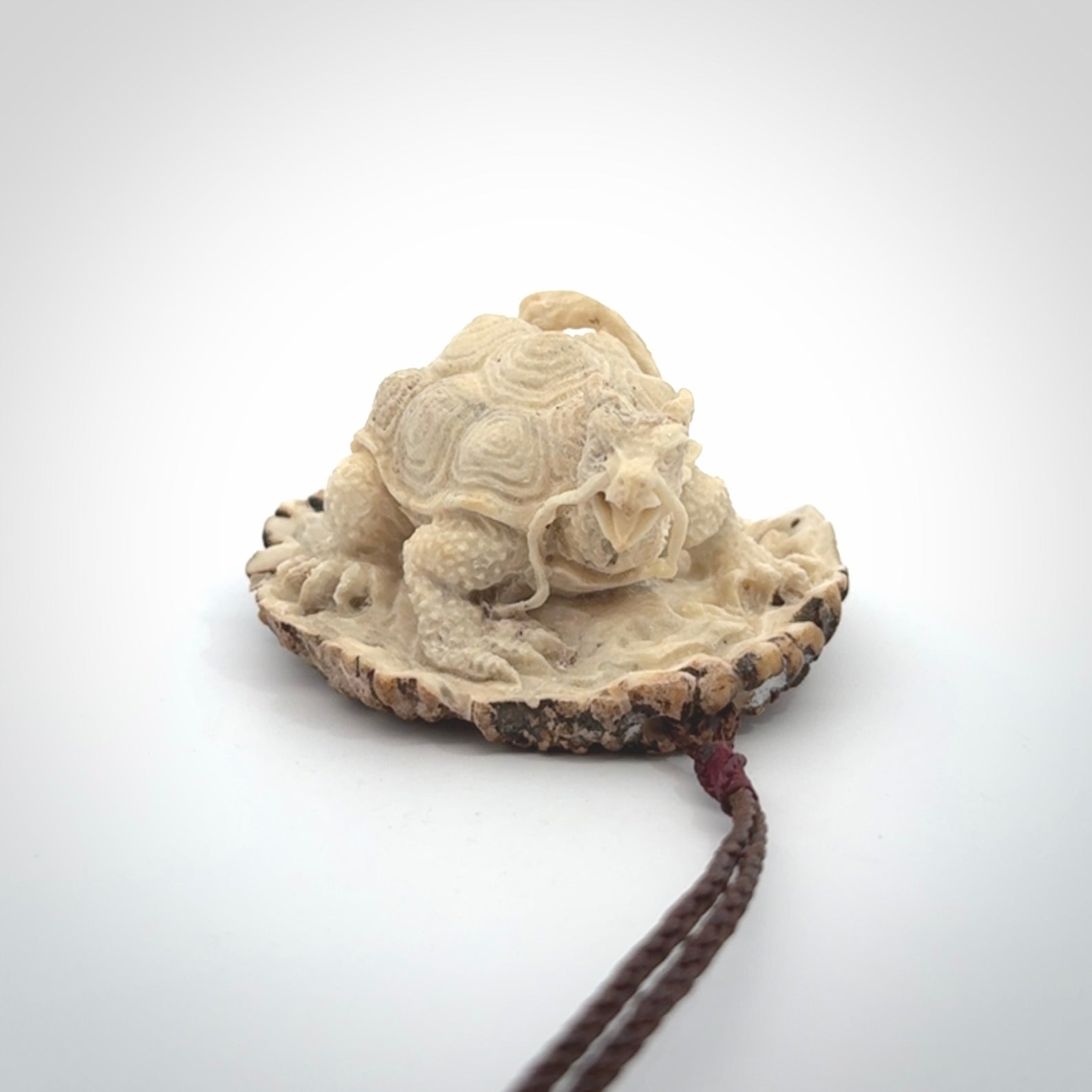 Hand carved deer antler dragon turtle pendant