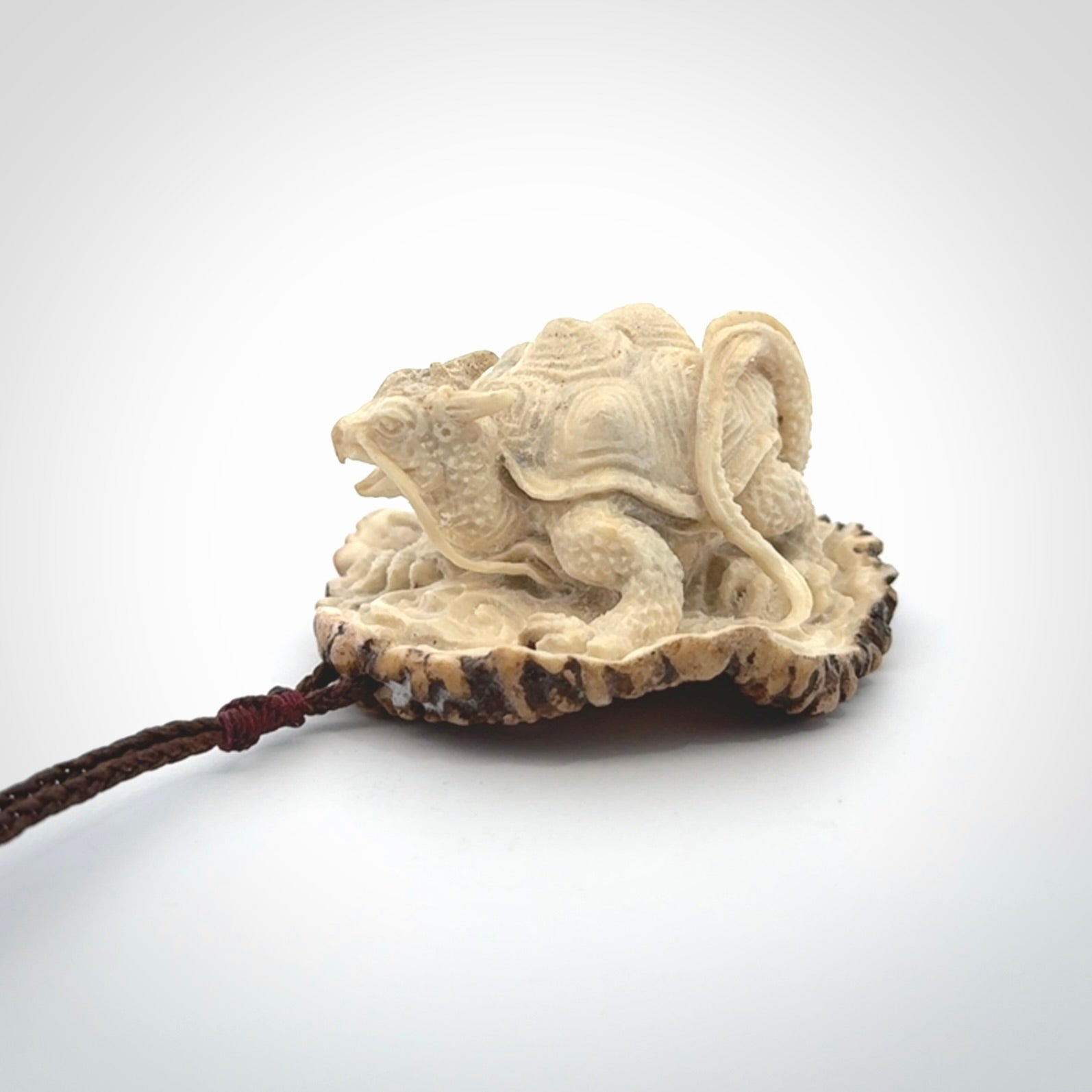 Hand carved deer antler dragon turtle pendant