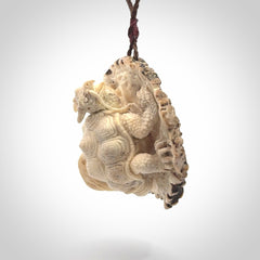Hand carved deer antler dragon turtle pendant