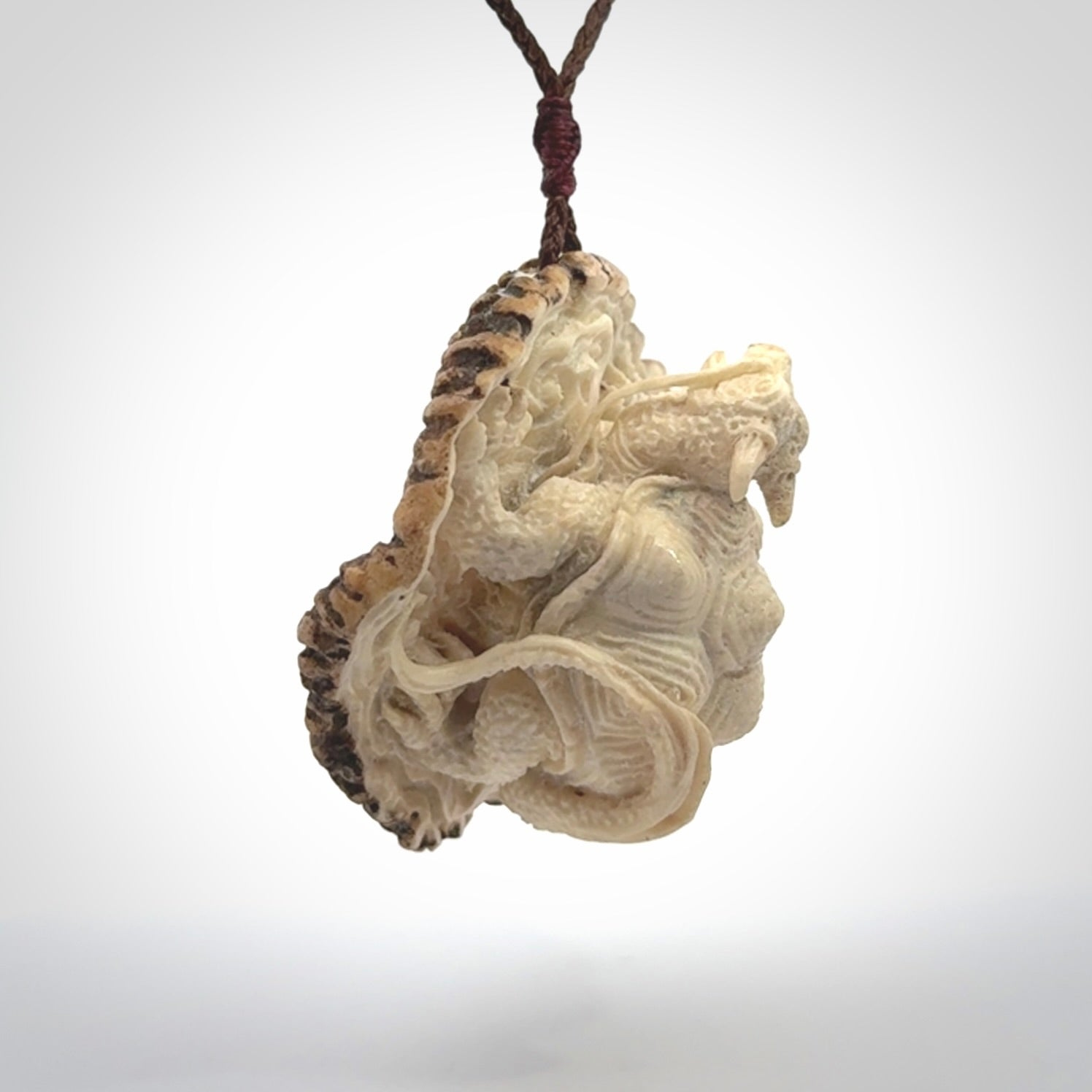 Hand carved deer antler dragon turtle pendant