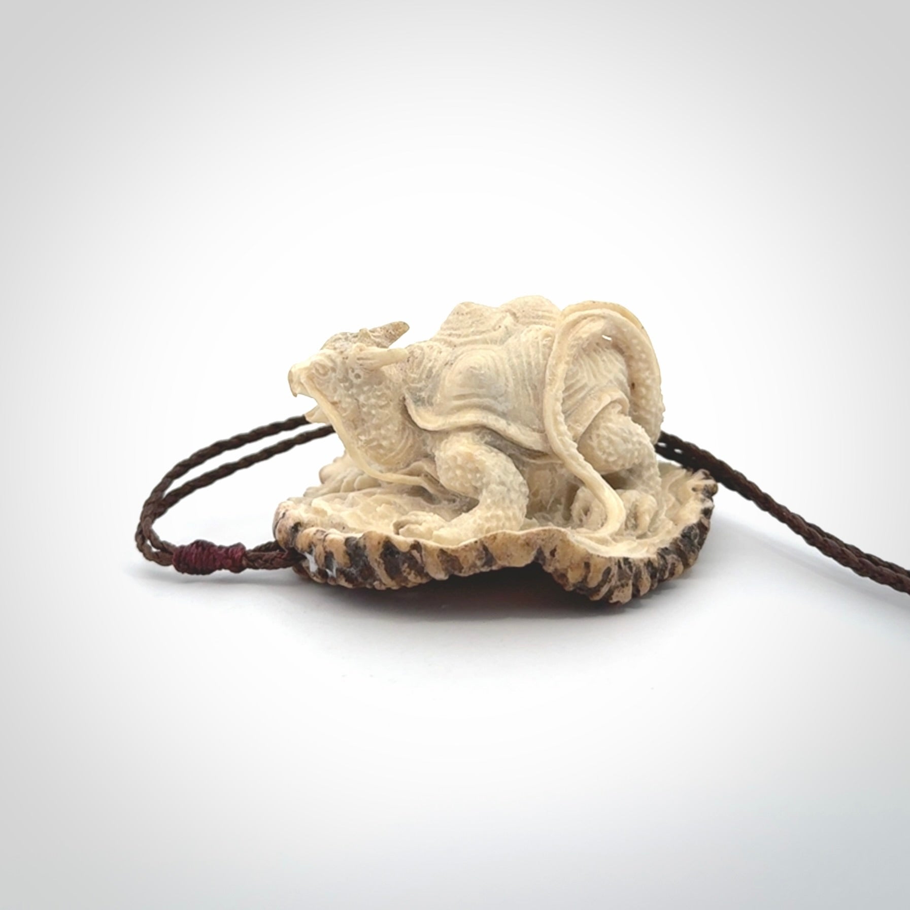 Hand carved deer antler dragon turtle pendant