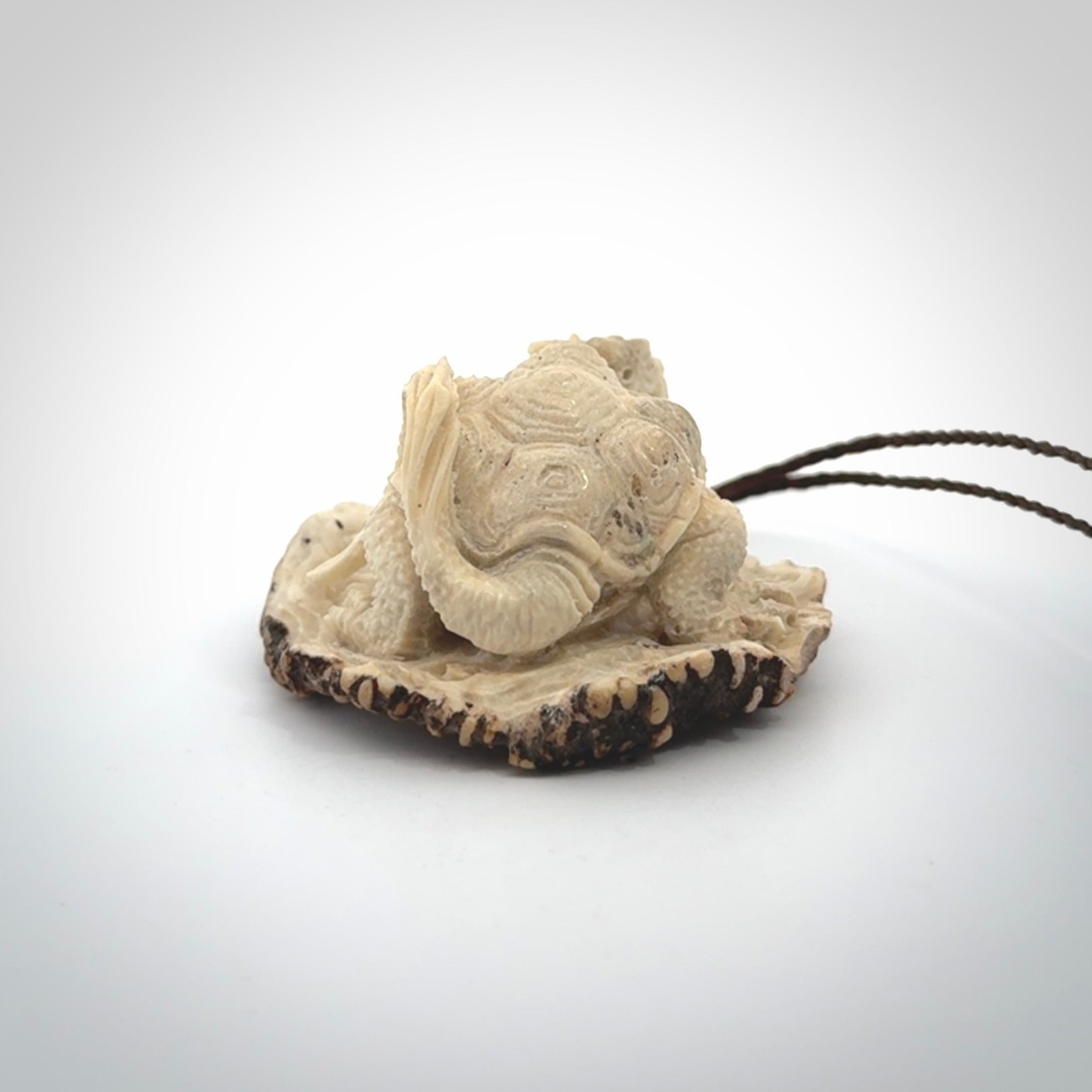 Hand carved deer antler dragon turtle pendant