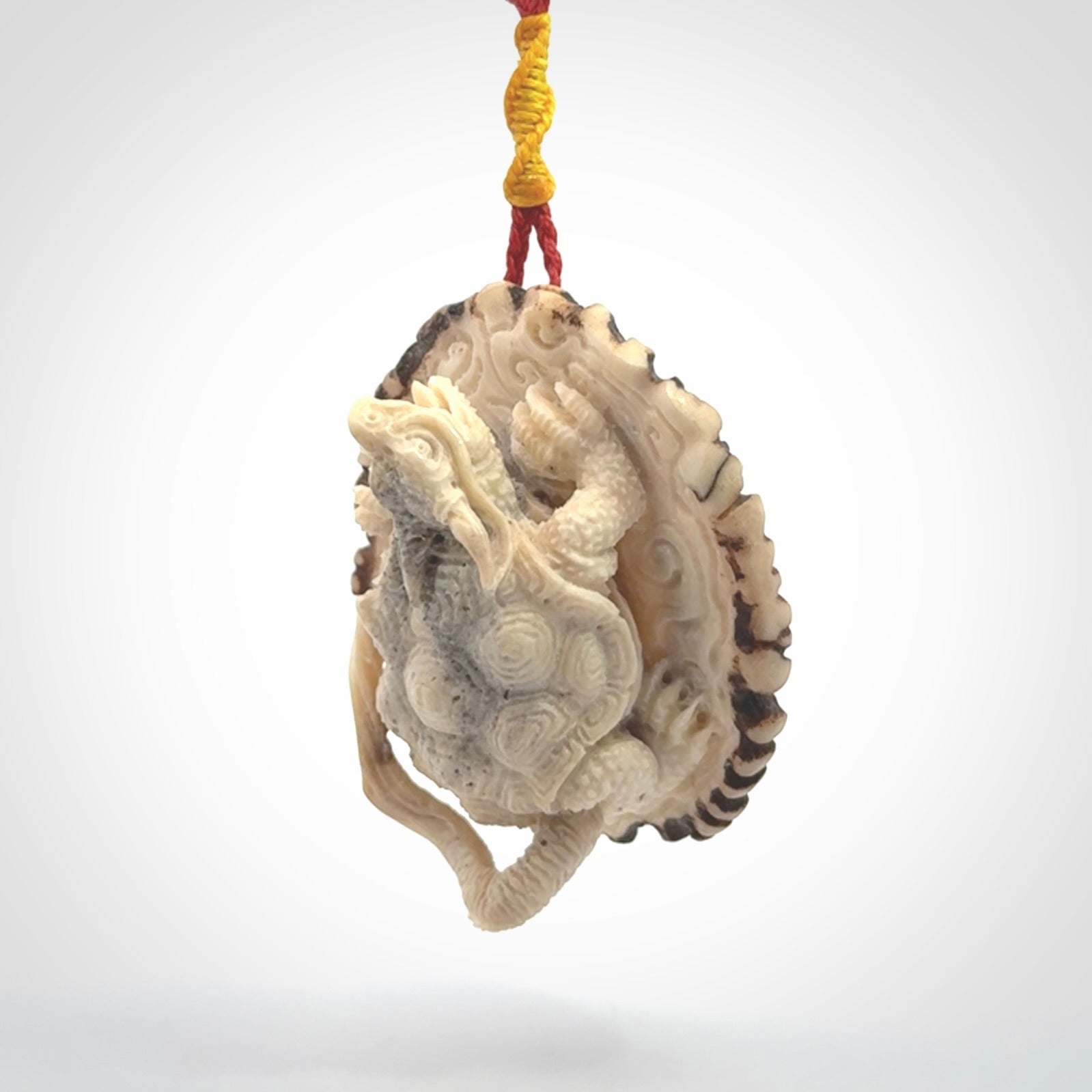 Hand carved deer antler dragon turtle pendant