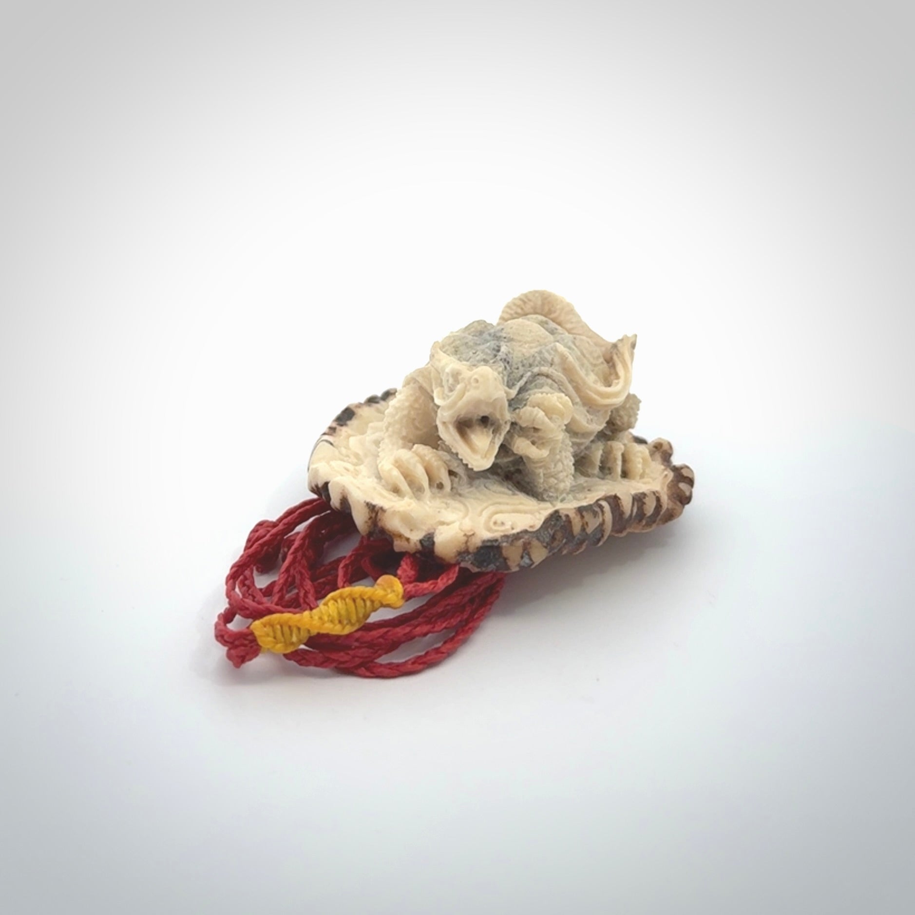 Hand carved deer antler dragon turtle pendant