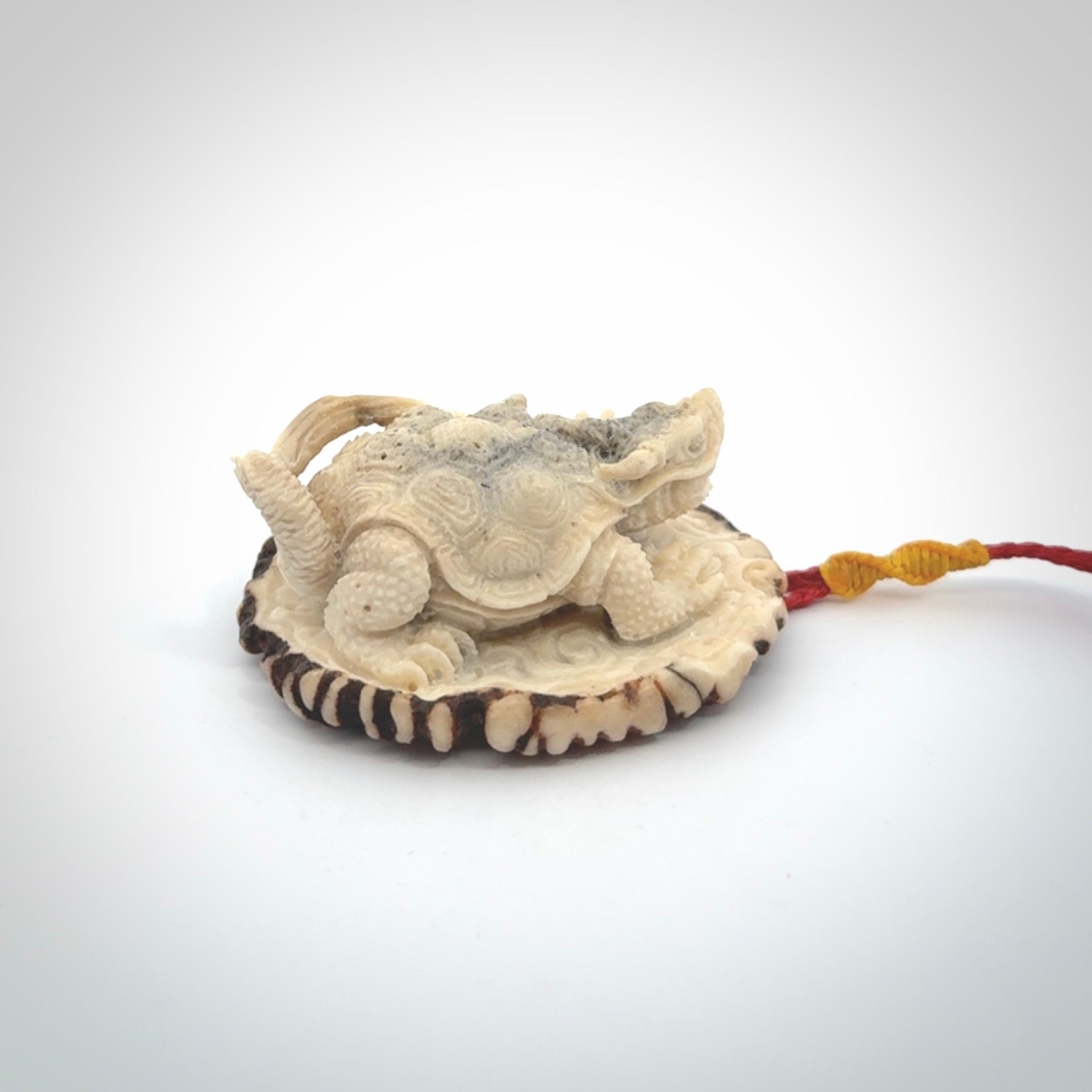 Hand carved deer antler dragon turtle pendant