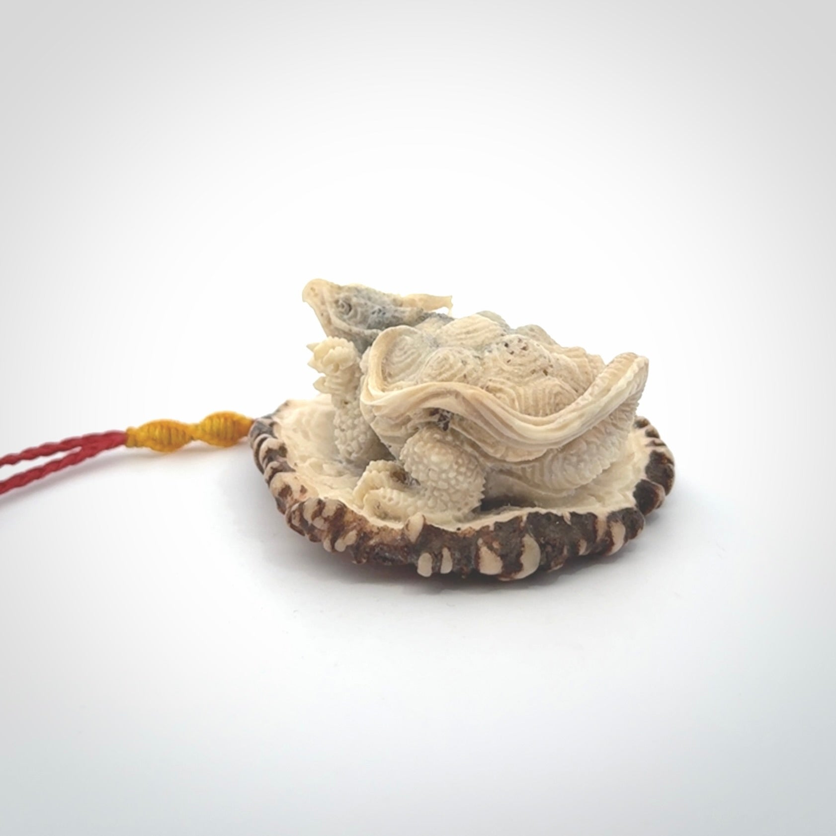 Hand carved deer antler dragon turtle pendant