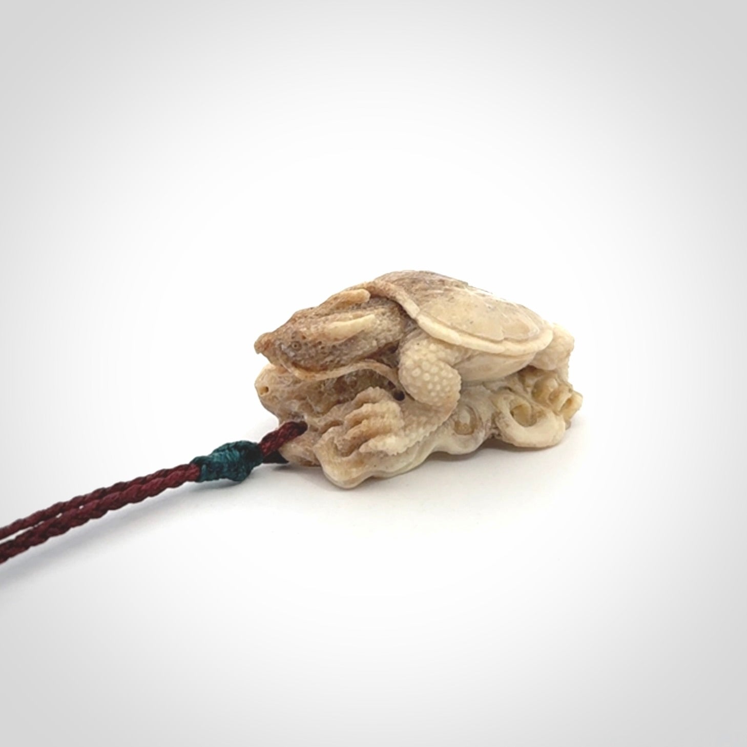 Hand carved deer antler dragon turtle pendant