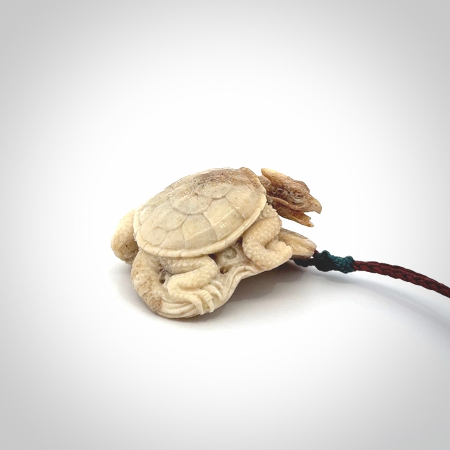 Hand carved deer antler dragon turtle pendant