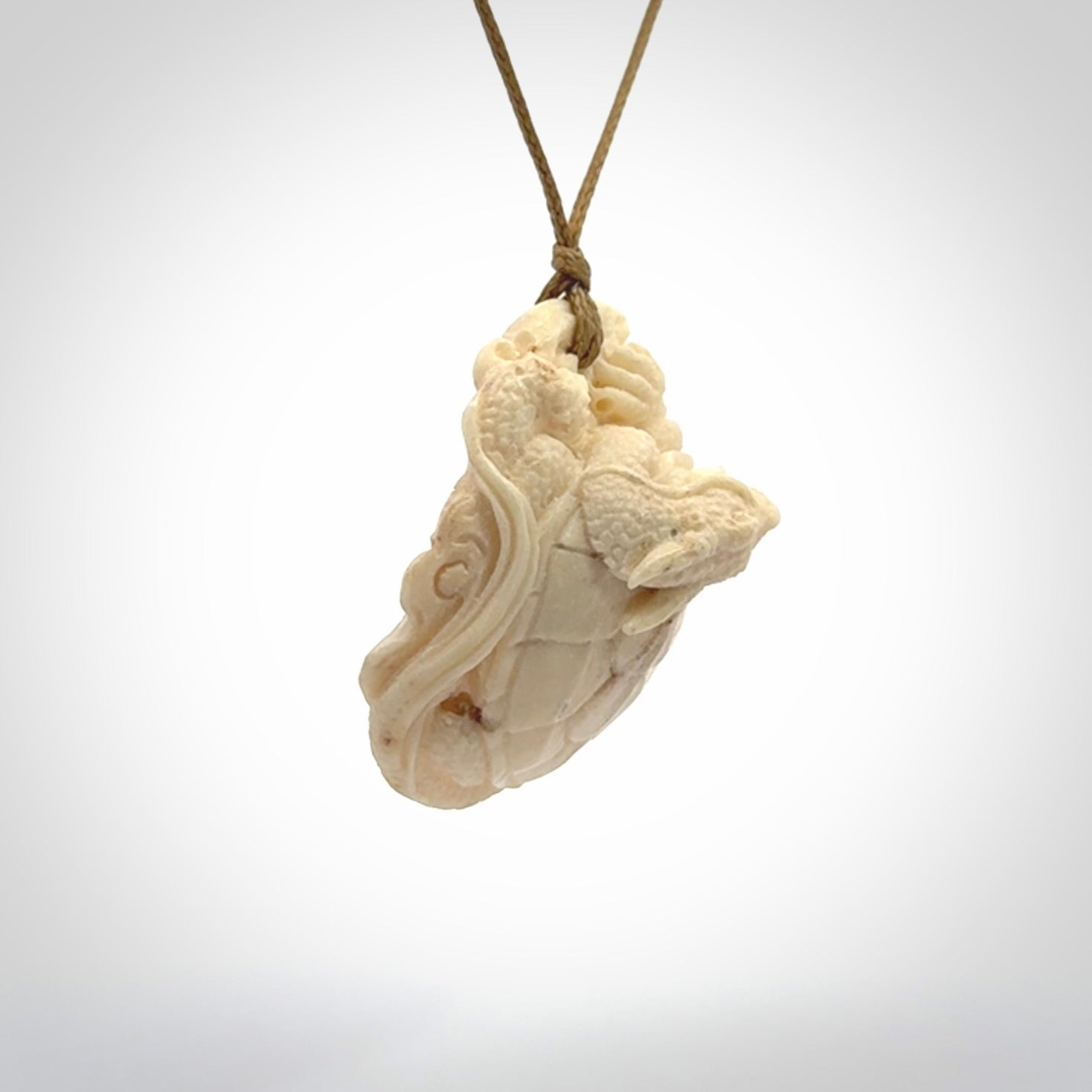 Hand carved deer antler dragon turtle pendant