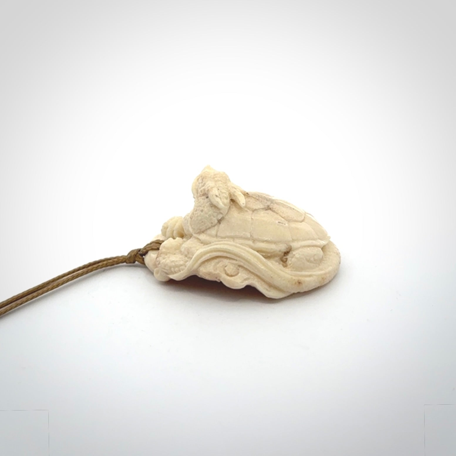 Hand carved deer antler dragon turtle pendant