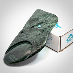 This is a large hand carved New Zealand Jade wheku pendant. It is made from New Zealand Jade and Paua shell.