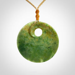 Hand carved New Zealand Flower Jade disc pendant