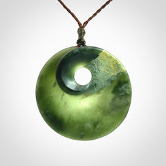 Hand carved New Zealand Jade disc pendant