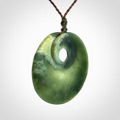 Hand carved New Zealand Jade disc pendant