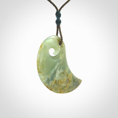 Beautifully Carved Koru drop pendant in delightful Jade