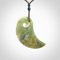 Beautifully Carved Koru drop pendant in delightful Jade