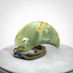 Beautifully Carved Koru drop pendant in delightful Jade