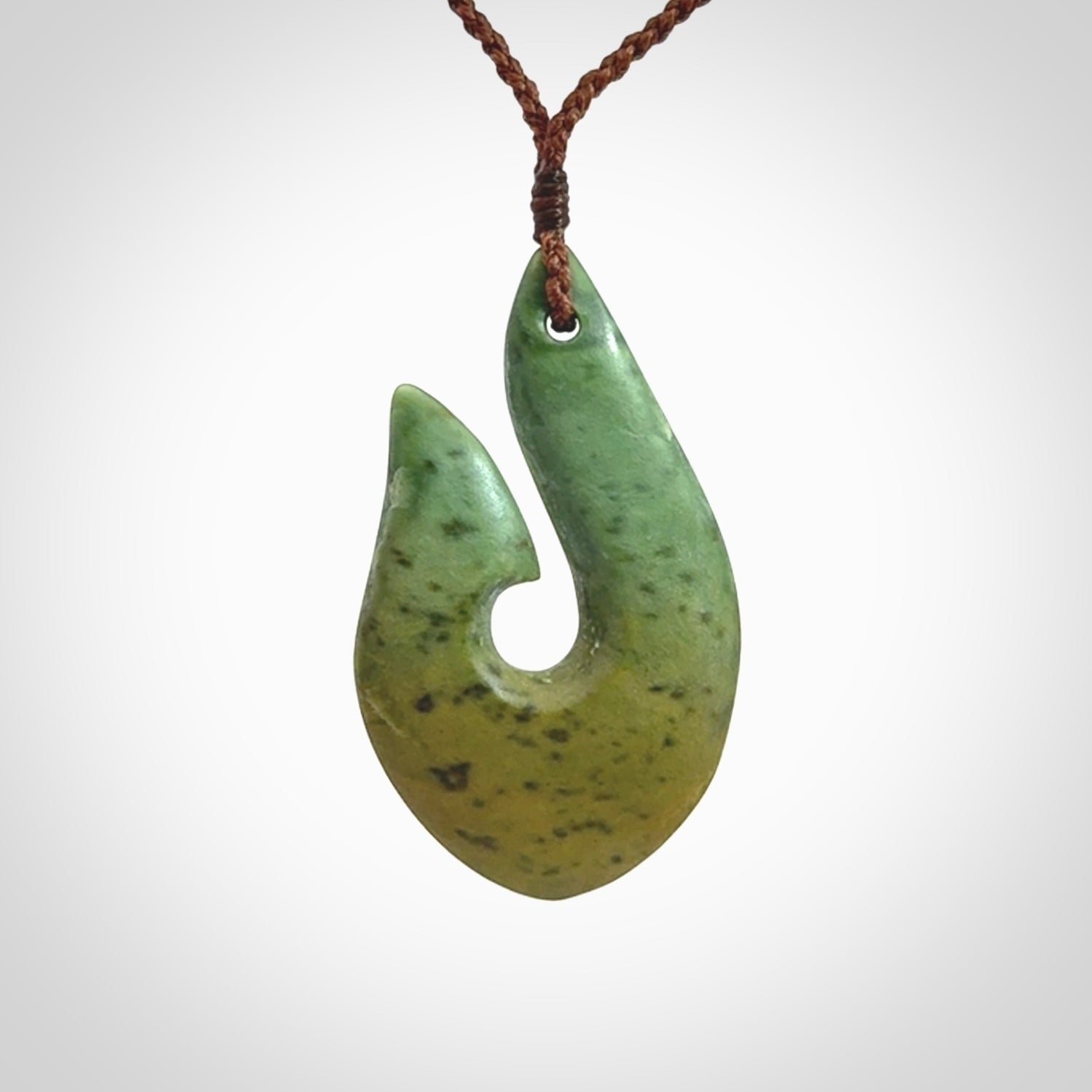 Hand carved New Zealand Jade Hook pendant