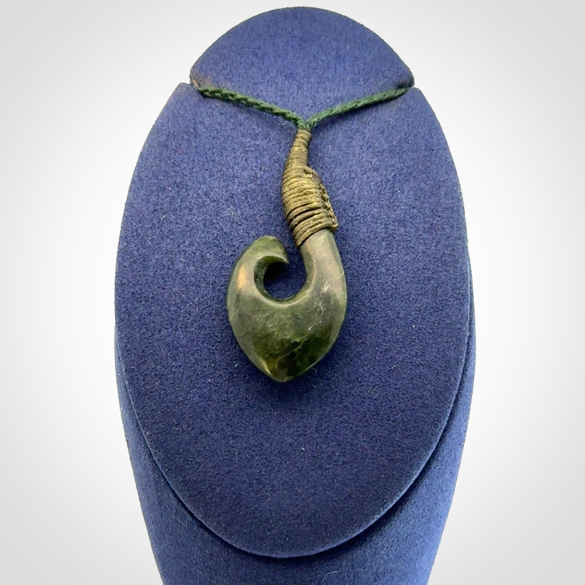 Hand carved New Zealand Jade hook pendant