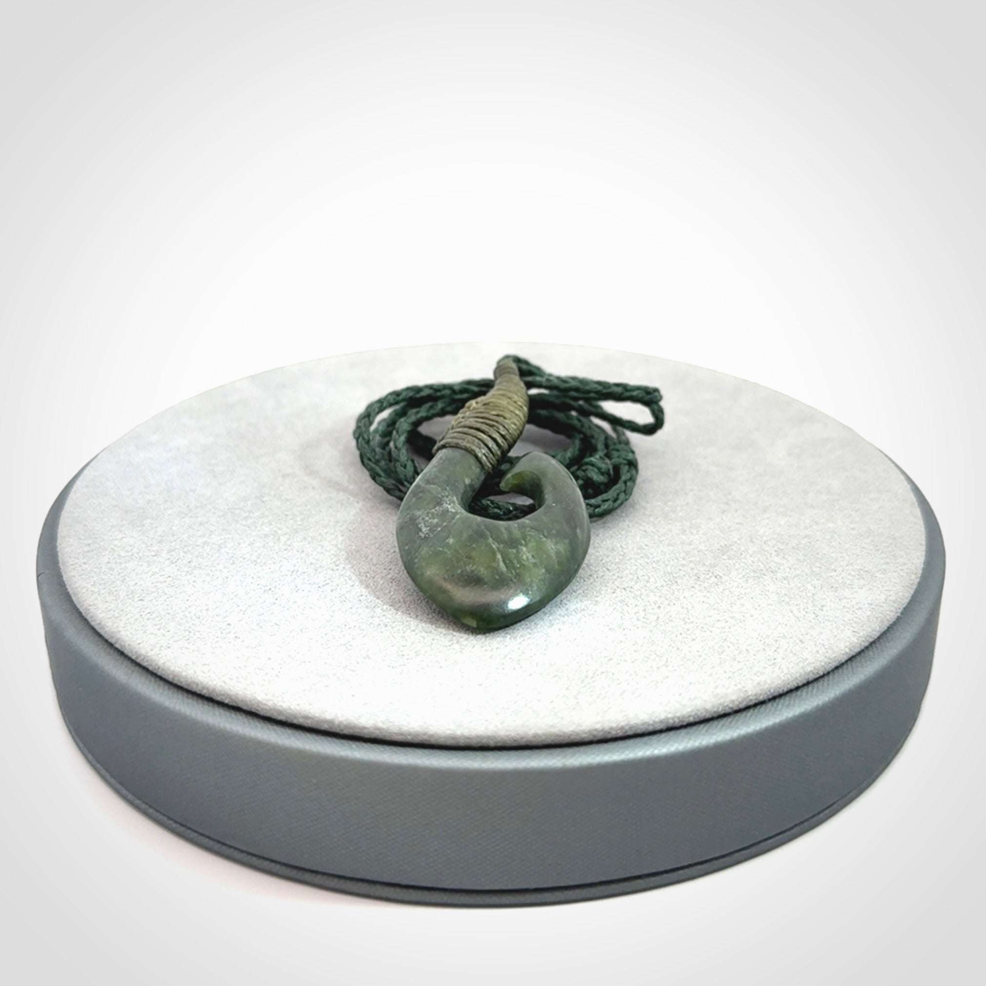 Hand carved New Zealand Jade hook pendant