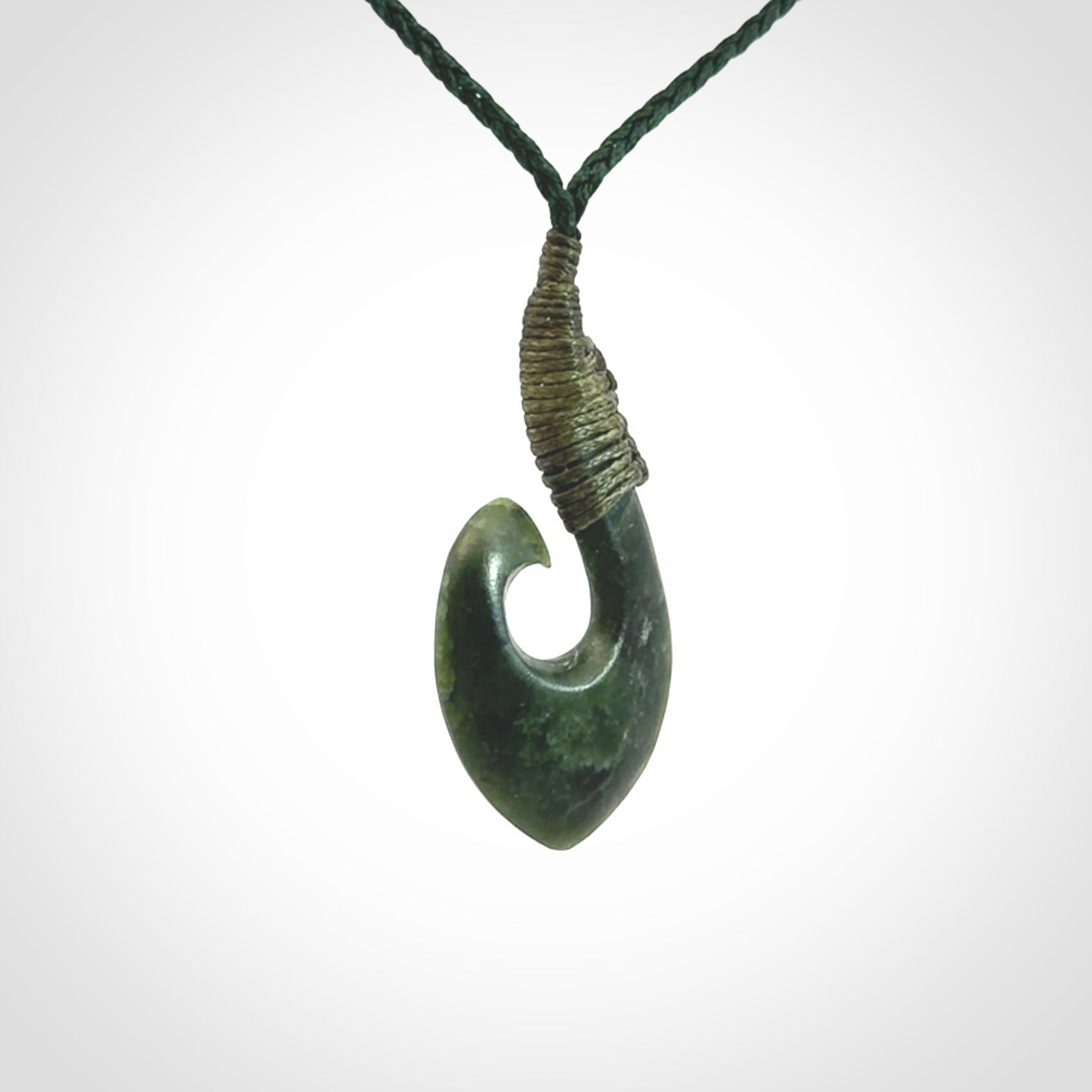 Hand carved New Zealand Jade hook pendant