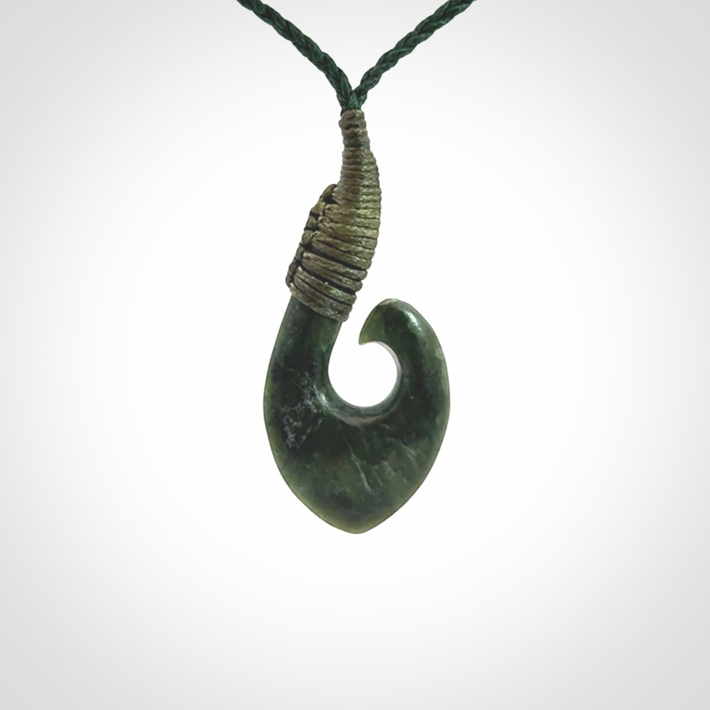 Hand carved New Zealand Jade hook pendant